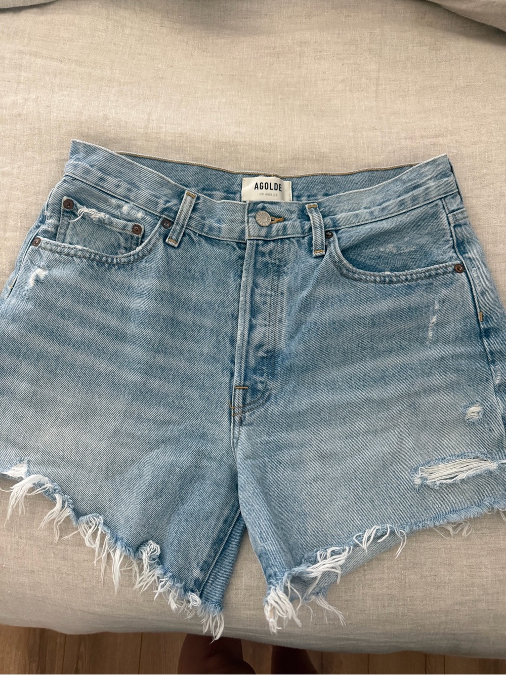 Agolde Light Wash Frayed Hem Denim Shorts